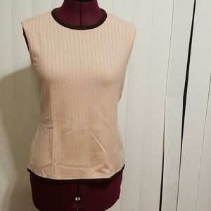 Light pink colored sleeveless blouse by escada